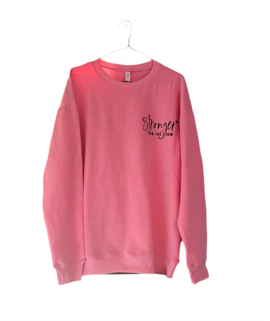 STRONGER THAN THE STORM WITH FRONT AND BACK DESIGN PINK PULL OVER 🩷